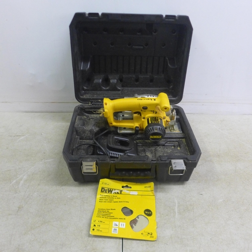 A DeWalt DW935 cordless power saw with charger no battery in case