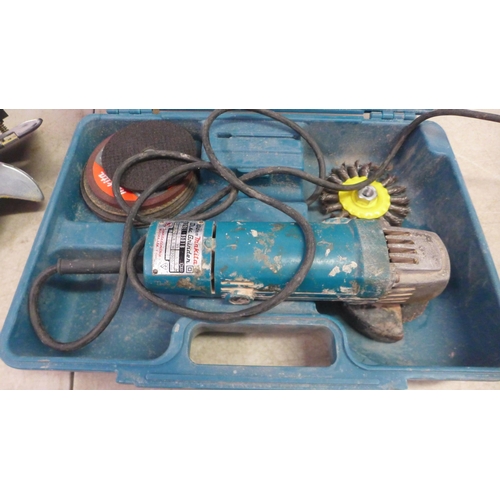 5007 - A Makita 95013, 110V angle grinder in case with a Makita SR2300, 110V 235mm circular saw