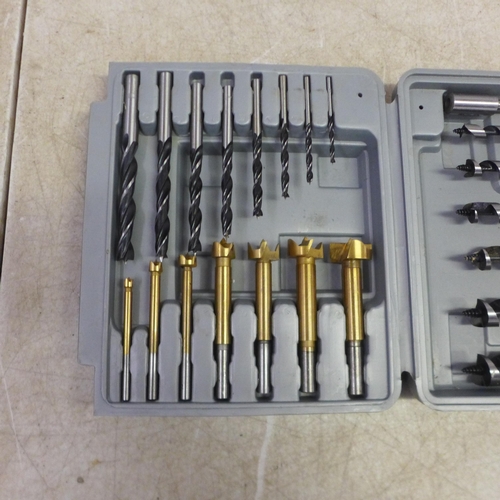 5016 - A Stanley 5002 chisel set , a wood drill bit set, a Makita 12 piece tungsten carbide tipped router b... 