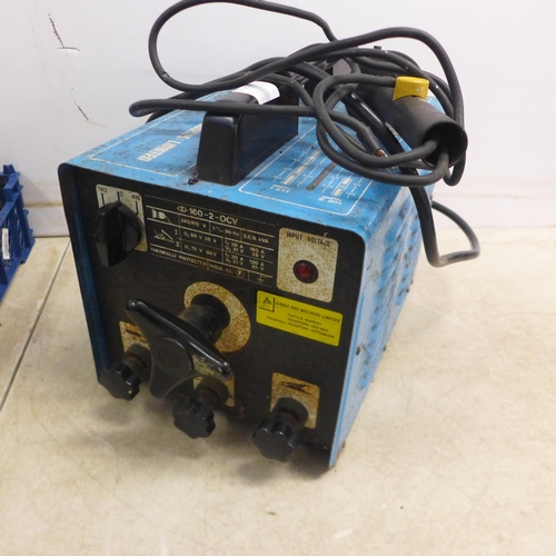 5017 - A SIP 160-2-OCV welder with cables and accessories including two welding masks and gauntlets etc.