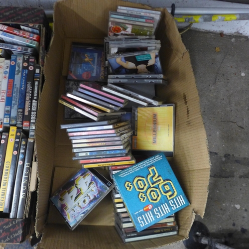 5066 - 5 boxes of various DVDs and CDs, an unused Fuji Film Finepix QS-7 printer and Trivial Pursuit Deluxe... 