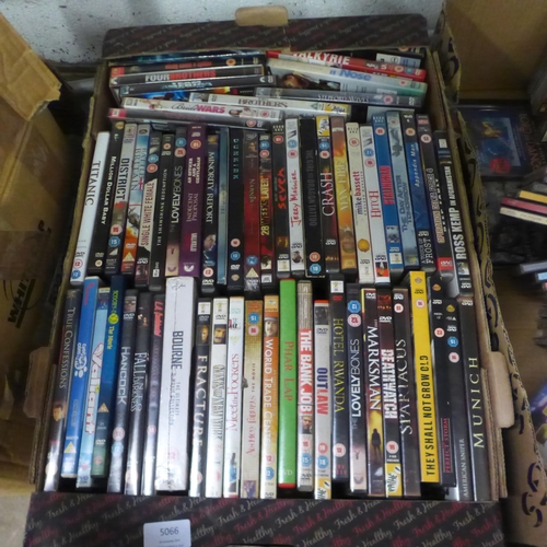 5066 - 5 boxes of various DVDs and CDs, an unused Fuji Film Finepix QS-7 printer and Trivial Pursuit Deluxe... 