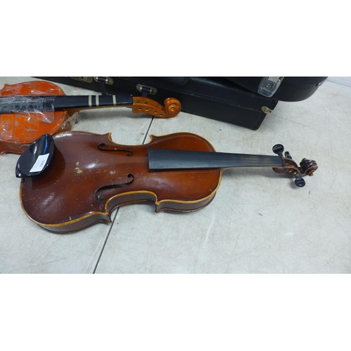 5081 - Two cased violins