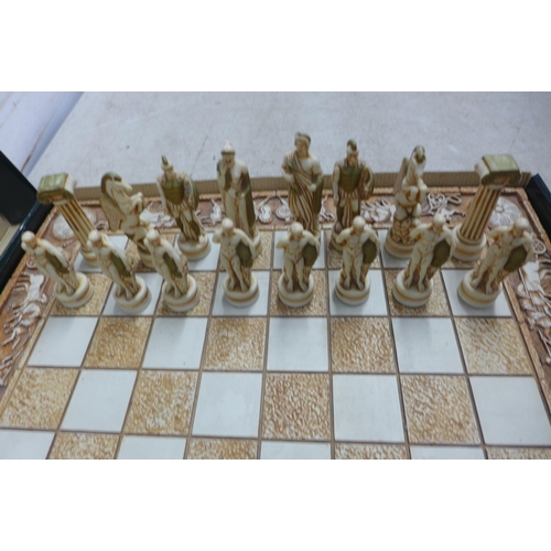 5090 - A Greek mythology themed chess board and full set of matching chess pieces