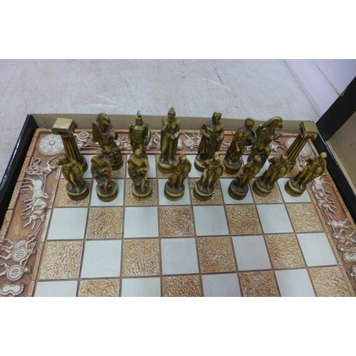 5090 - A Greek mythology themed chess board and full set of matching chess pieces