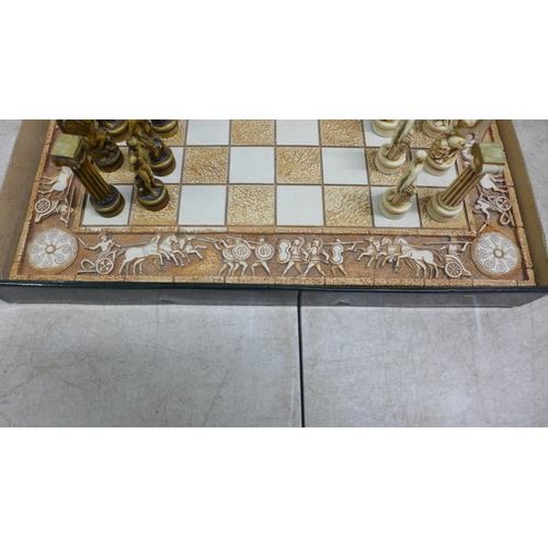 5090 - A Greek mythology themed chess board and full set of matching chess pieces