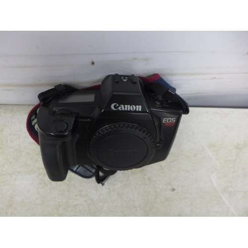 5096 - A Canon EOs 50E and a Canon C020 film camera with Sigma 35/80 zoom lens, a Sigma 28/80 zoom lens, a ... 