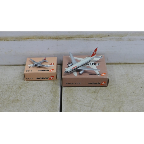 5105 - A collection of model planes including a Cadbury's Dairy Milk plane, a KLM Boeing 747, US Air Force,... 