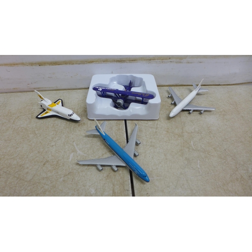 5105 - A collection of model planes including a Cadbury's Dairy Milk plane, a KLM Boeing 747, US Air Force,... 