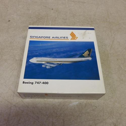 5111 - 4 Herpa model planes including a KLM Boeing 747-400 Royal Dutch Airlines 1:500 scale model plane, a ... 