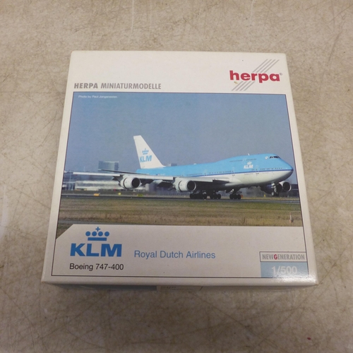 5111 - 4 Herpa model planes including a KLM Boeing 747-400 Royal Dutch Airlines 1:500 scale model plane, a ... 