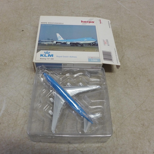 5111 - 4 Herpa model planes including a KLM Boeing 747-400 Royal Dutch Airlines 1:500 scale model plane, a ... 