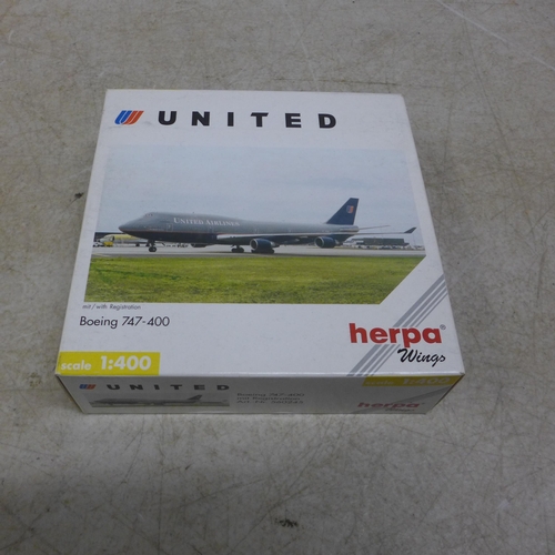 5111 - 4 Herpa model planes including a KLM Boeing 747-400 Royal Dutch Airlines 1:500 scale model plane, a ... 