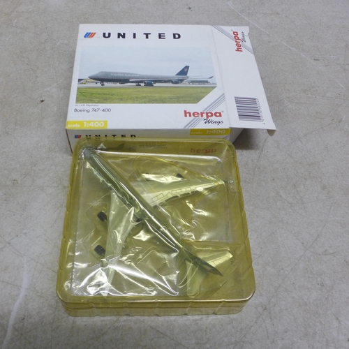 5111 - 4 Herpa model planes including a KLM Boeing 747-400 Royal Dutch Airlines 1:500 scale model plane, a ... 