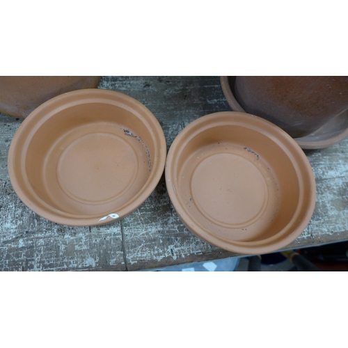 5221 - A quantity of assorted terracotta plant pots including pot trays and a strawberry planter