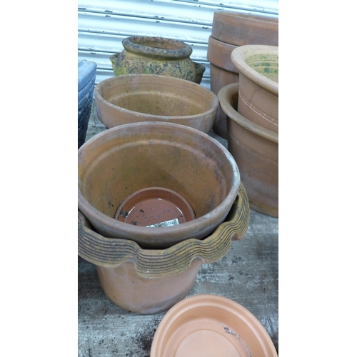 5221 - A quantity of assorted terracotta plant pots including pot trays and a strawberry planter