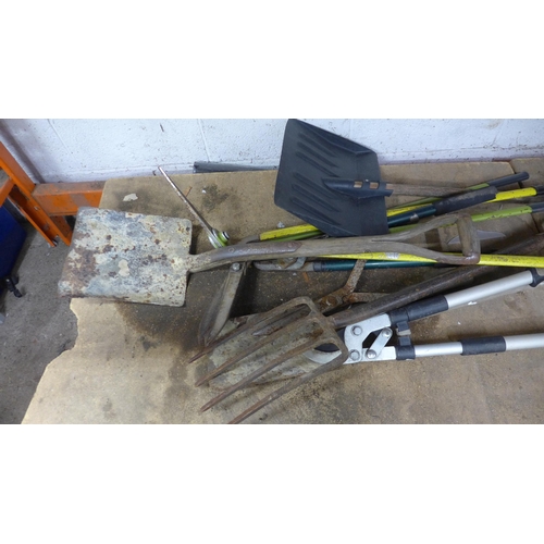 5233 - A quantity of garden tools including spades, drain rods, shears, brushes, rakes, forks etc.