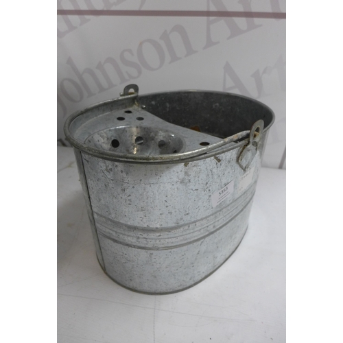 5353 - A galvanized 2 gallon watering can, a small anchor, a galvanized mop bucket and a metal pot