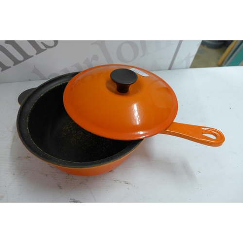 5356 - A quantity of Le Creuset cast iron cookware including a volcanic orange 20cm saucepan, 2 volcanic or... 