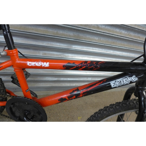 5188 - 2 boys bikes including a Crew Extreme BMX and a Concept Grizzly MTB