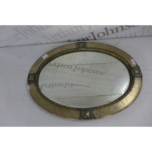 5368 - A vintage metal framed mirror