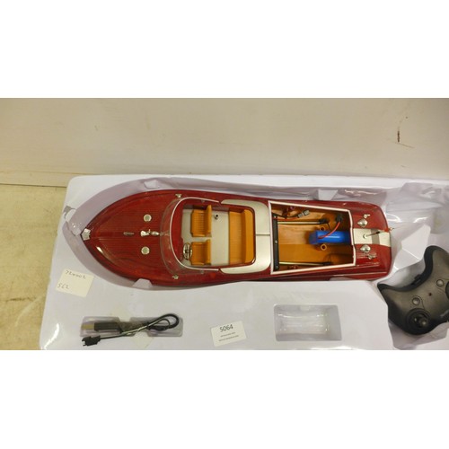 5064 - A collection of assorted remote control vehicles including a H100 Hi-Speed racing boat, a Toyabi T03... 