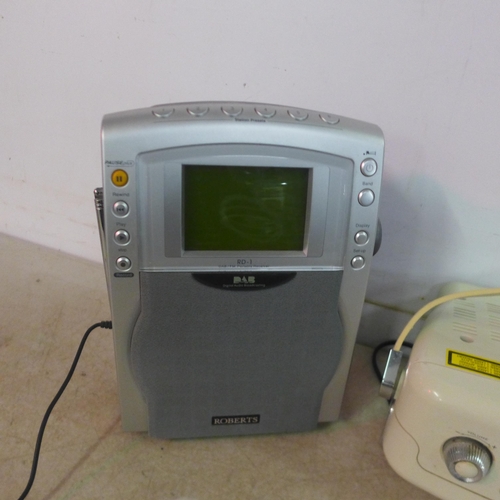 5130 - A quantity of stereos including Tevion alarm clock CD Am/FM radio, a Roberts RD-1 DAB/FM portable re... 