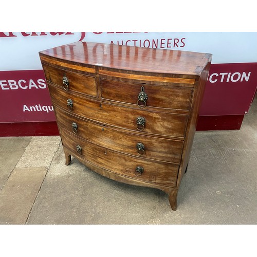 114 - A George III inlaid mahogany bow front chest of drawers