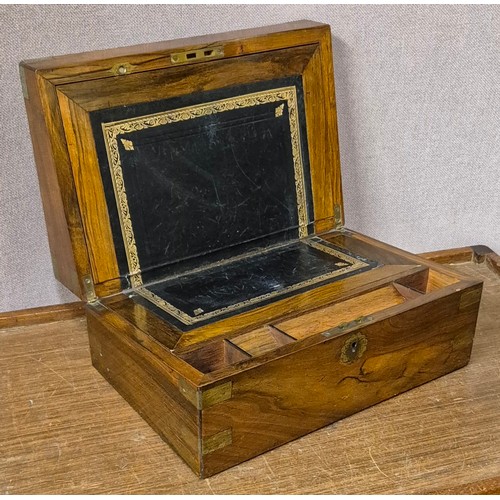 267 - A Victorian walnut and brass mounted writing slope