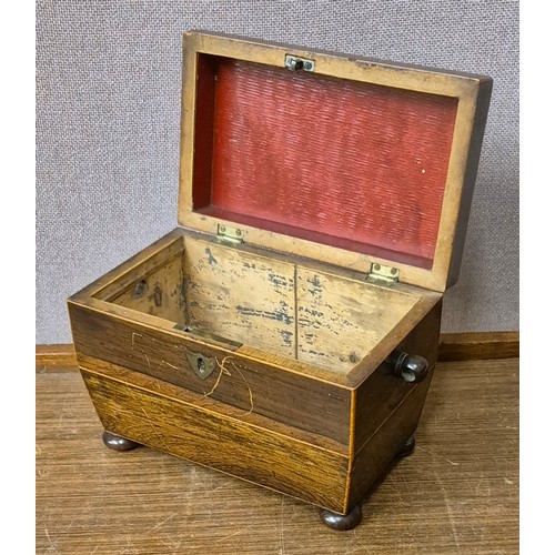 266 - A Regency inlaid rosewood sarcophagus shaped tea caddy