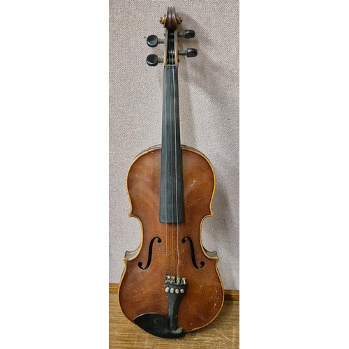 275 - A cased violin (length of back inc. button 35cm) and bow