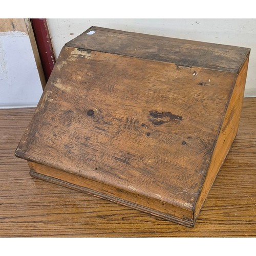 277 - A Victorian mahogany stationary rack, a table top index filing cabinet and a clerks writing slope