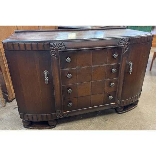 176 - Two early 20th Century carved oak sideboards