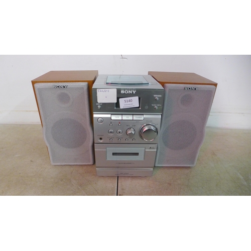 5140 - A Sony CMT-EP505 micro hi-fi system with speakers