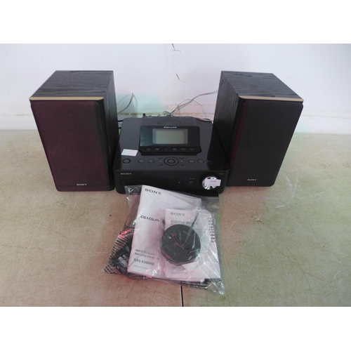 5141 - A Sony Giga Juke HDD audio system with 2 speakers with digital media dock