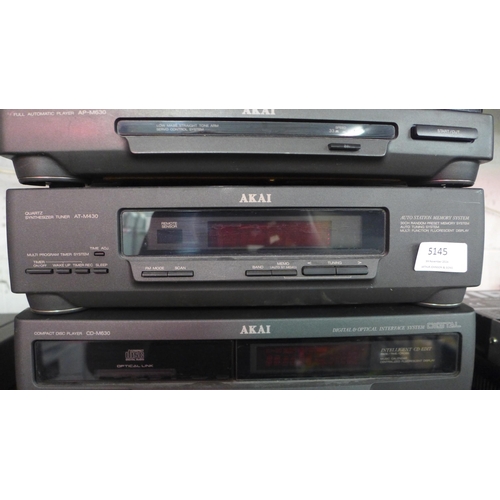 5145 - A quantity of Akai stereo equipment including an AP-M630 full automatic turntable record player, an ... 