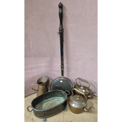 268A - Two Victorian copper kettles, a warming pan, jardiniere and a ewer