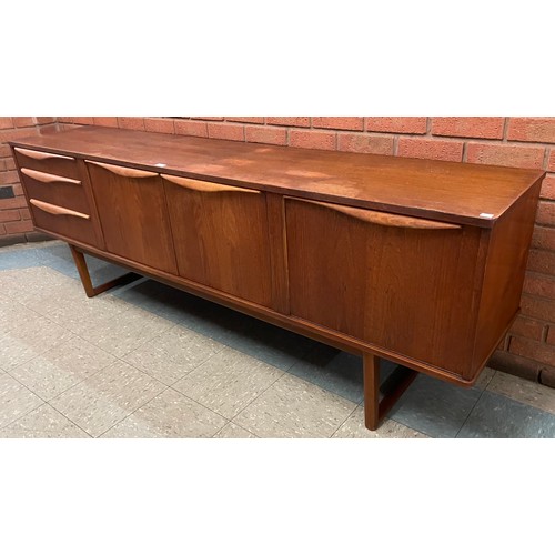 3 - A teak sideboard