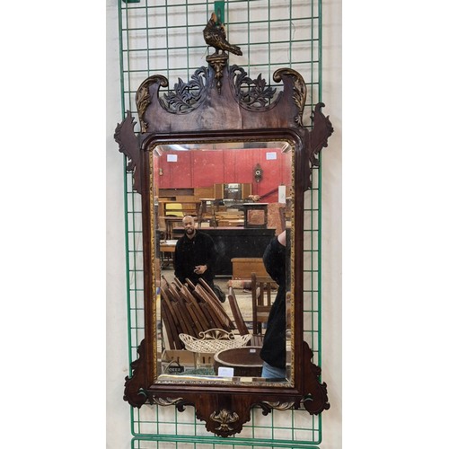 295 - A George II mahogany and parcel gilt framed mirror