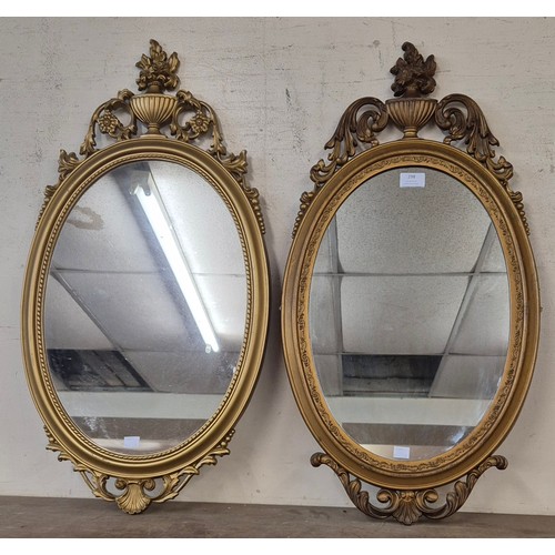 298 - A pair of similar French style gilt framed mirrors