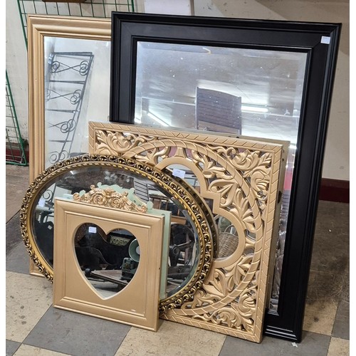 299 - Four gilt framed mirrors and an ebonised mirror