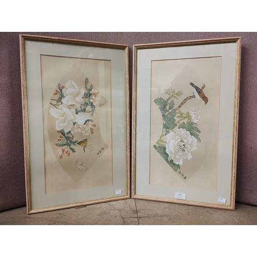 309 - Two framed Oriental silks