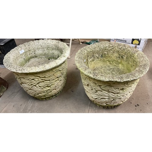 252 - A pair of concrete garden planters