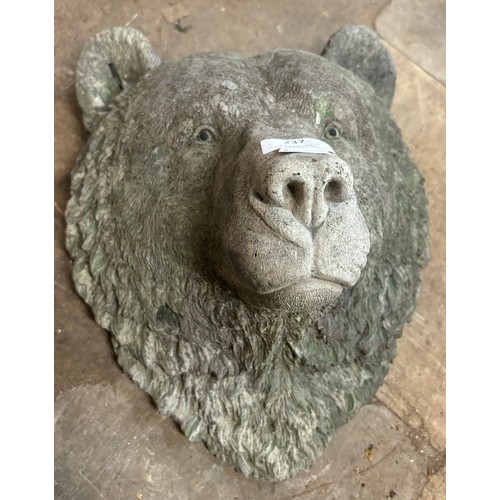 237 - A concrete garden plaque of a grizzly bear face