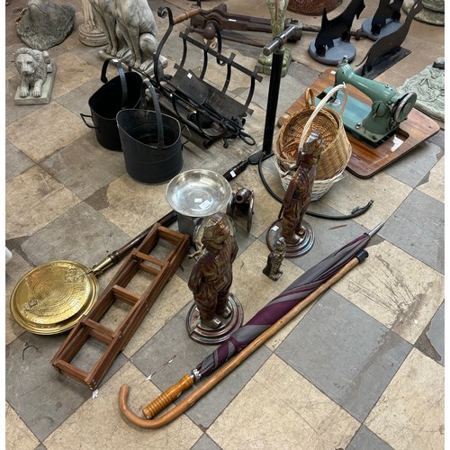 241 - A pair of cast metal fireplace figures, an air pump, brass warming pan, wicker baskets, scales, sewi... 