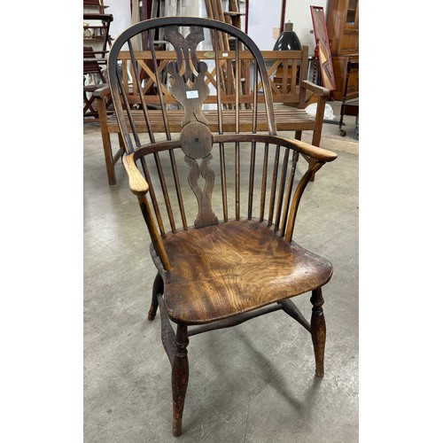 191 - A 19th Century elm and ash Windsor chair, three beech wheelback kitchen chairs and two oak dining ch... 