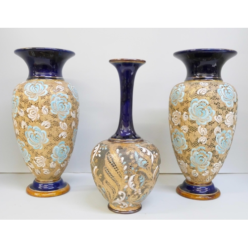 2011 - A pair of Doulton Lambeth vases, 27.5cm, and one other