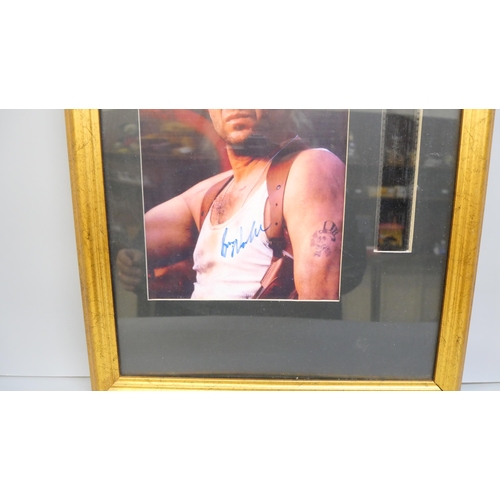 2018 - A Bruce Willis signed display, no CoA