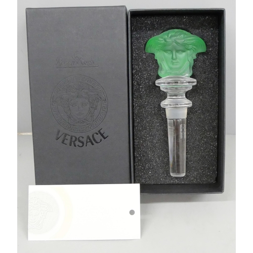 2054 - A Versace green glass bottle stopper, boxed