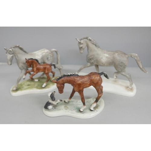 2060 - A set of three Goebel horse figures, one with a dog